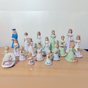 Growing up, porcelain birthday dolls, including graduate